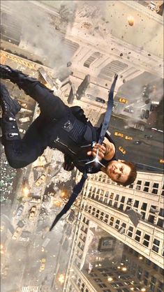 a man flying through the air on top of a building in a sci - fi world