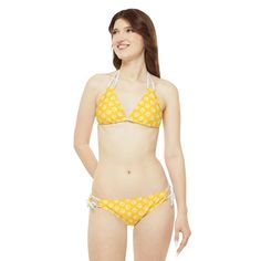 Made with 4-way stretch Tricot (82% Microfiber, 18% Spandex), this Goldenpaw Strappy Bikini Set is the perfect companion to all summer escapades. With adjustable elastic straps for a perfect fit, this complete two-piece swimsuit will become an instant summer hit. .: Material: 82% microfiber polyester, 18% spandex.: Medium fabric (7.5 oz /yd² (250 g/m²)).: Two piece swimsuit .: Adjustable elastic straps.: Removable cups.: Assembled in the USA from globally sourced parts.: Seam thread color automa Summer Strappy Stretch Swimwear, Strappy Swimwear For Pool, Adjustable Yellow Swimwear For The Pool, Strappy Stretch Summer Swimwear, Stretch Strappy Swimwear For Pool, Yellow Strappy Swimwear For Poolside, Adjustable Strappy Swimwear For Beach, Fitted Bra-friendly Swimwear For Water Polo, Adjustable Strappy Swimwear For Sunbathing