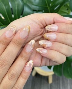 a woman's hands with french manies on them