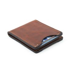 CARRY ONLY WHAT YOU NEED - With just enough room for what you need and no excess bulk, this bifold wallet is an everyday essential. It fits comfortably in your front or back pocket, keeping your cash and cards easily at hand and ready to go. PREMIUM FULL GRAIN LEATHER WALLET - Fine leather never goes out of style, and we’ve combined it with minimalist design principles to create this classic yet casual piece. Choose from 7 unique colors: Avalanche Gray, Midnight Black, Charred Oak, Tobacco Snake Leather Business Card Case, Black Whiskey, Full Grain Leather Wallet, Slim Wallet Men, Bifold Wallet Men, Slim Leather Wallet, Leather Passport Holder, Front Pocket Wallet, Wallet For Men