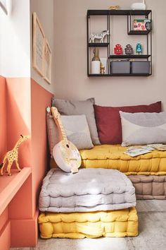 a living room filled with lots of furniture and decor on top of it's walls