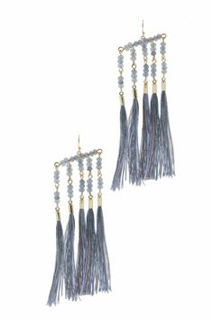 From the festival to first-dates, our Eccentric Tassel Kavali Earring is sure to make a statement! Fun and fringey tassels dangle below an array of natural stone beads for a boho-chic look. Materials: Natural Stone, Polyester Thread, Brass Size: 4" x 1.5" Hook Backing Adjustable Fringe Tassel Dangle Earrings, Adjustable Beaded Tassel Earrings, Tassel Earring, Natural Stone Beads, First Dates, Slate Gray, Beaded Fringe, Tassel Fringe, The Festival