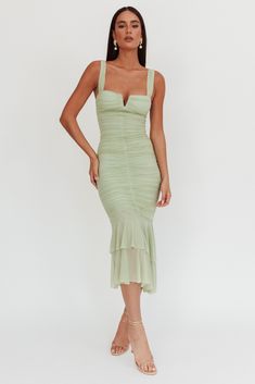 Pistachio maxi dress Padded bust Lined V-wire in bust Stretchy Ruching throughout Mesh fabric Fishtail style Zipper in back Make an entrance in our stunning Nadia maxi dress. Featuring a fishtail style and ruching throughout, we're in love! Perfect for a wedding or prom! Team it with a clutch and nude heels for a look that will turn heads. MODEL INFO Model is wearing size XS Height: 5'3" Bust: 33" Waist: 24" Hips: 35" CARE Hand Wash Cold. Do Not Iron. MATERIAL POLYESTER/SPANDEX Fishtail Maxi Dress, Iron Material, Clothing Tags, Dress Satin, Nude Heels, Dress Romper, Mesh Dress, Tulle Dress, Guest Dresses