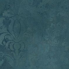 a blue wallpaper with an ornate design on the back and sides, in shades of green