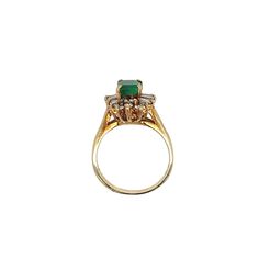 Ring Details: ✔ Gold Karat: 14K ✔ Ring Size: 7 ✔ Ring Weight: 3.9 grams ✔ Mounting: Prong ✔ Shank: Cathedral ✔ Diamonds: (6 baguette-cut diamonds, 0.24ctw) (14 round cut diamonds, 0.19ctw)  Emerald Details: ✔ Carat: 1.00 ✔ Cut: Emerald ✔ Origin: Colombia ✔ Color: Green (deep) ✔ Clarity: Very good ✔ Luster: Excellent Vintage natural Emerald and natural diamond ring in 14k solid yellow gold. This vibrant Emerald bears excellent color and luster. It's well contrasted by a round and baguette-cut dia Formal Cluster Ring With Baguette Diamonds, Formal Baguette Diamond Cluster Ring, Classic Formal Marquise Emerald Ring, Classic Formal Emerald Marquise Ring, Classic Gold Marquise Emerald Ring, Classic Marquise Emerald Ring In Gold, Emerald Ring With Baguette Cut For Formal Events, Formal 14k Gold Emerald Ring With Center Stone, Anniversary Yellow Gold Ruby Ring With Baguette Diamonds