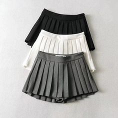 Get ready to rule the school with our School Girl Pleated Skirt! This skirt features a classic pleated design that will have heads turning. Perfect for both casual and formal occasions, this skirt is a must-have in your wardrobe. Be the ultimate school girl with this unique and playful piece. Materials: 100% Polyester Stretch Level: Non-stretch Style: Classic, Preppy Details: Sharp pleats, side zipper closure Waist Line: High waist Pattern: Solid color Imported Disclaimer: Colors may vary slight Fesyen Korea, Skirts Korean, Preppy Mode, Skirt Korean, Pleats Pattern, Womens Pleated Skirt, Rok Mini, Short Pollera, Micro Skirt