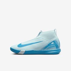 the nike zoom basketball shoe in white and blue