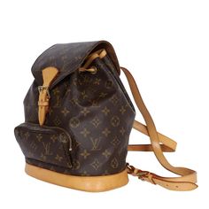 Authentic, pre-loved Louis Vuitton brown monogram Montsouris backpack Mm (medium size). Features monogram canvas with leather trim, front zippered pouch, top string closure with buckle front flap, the interior has a brown textile lining with slip pocket, and adjustable shoulder straps. This bag is perfect for shopping, travel, school, and hands-free needs. Unisex bag! Authenticity date code: SP0977 Made in France Classic Brown Monogram Canvas Backpack, Luxury Leather Trim Standard Backpack, Luxury Brown Monogram Canvas Backpack, Luxury Brown Leather On-the-go Backpack, Lv Montsouris Backpack, Leather Formal Shoes, Pre Owned Louis Vuitton, Quality Handbags, Leather Material