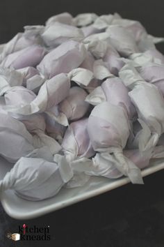 a white plate topped with lots of crumpled paper