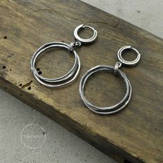 Earrings are made of oxidized silver 925  Dimensions:The whole length: 1.69"  /  4.3cmdiameter circles: 0.94 "  /  2.4cmSingle earring's weight : 3 gTO USE DISCOUNT, YOU NEED TO ADD TO YOUR CART PRODUCTS WITH MINIMUM PRICE OF 150$ AND USE THE COUPON : 15OFFThank you for visiting! Sterling Silver Circle Earrings With Oxidized Finish, Minimalist Round Earrings With Oxidized Finish, Minimalist Oxidized Round Earrings, Modern Oxidized Metal Hoop Earrings, Modern Metal Hoop Earrings With Oxidized Finish, Minimalist Silver Earrings With Oxidized Finish, Minimalist Silver Hoop Earrings With Oxidized Finish, Modern Silver Hoop Earrings With Oxidized Finish, Minimalist Metal Earrings With Oxidized Finish