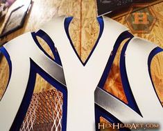 a close up of the letters and numbers on a basketball uniform that has been cut out