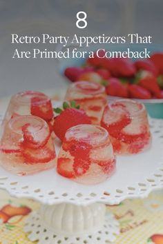 some strawberries are sitting on a plate with ice and strawberries in the background