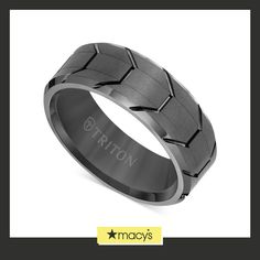 a men's wedding band with black ceramic inlays and an arrow design