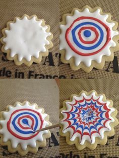 three decorated cookies with red, white and blue icing on top of each cookie