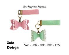 two keychains with bows on them and the words zolla design written in white