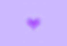 a purple heart shaped object in the sky