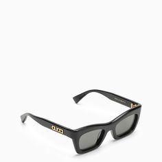 Black shiny acetate sunglasses from Gucci featuring a rectangular shape, embossed gold-tone metal logo on the temples and solid grey lenses. Size Type: INTMaterial: PvcSKU: 791813J0740/O_GUC-1012_100 Our Products Are 100% Genuine. In All Cases We Stand By The Authenticity Of Every Product Sold On Our Site. Classic Rectangular Sunglasses For Evening, Gucci Sleek Square Frame Sunglasses, Sleek Gucci Square Frame Sunglasses, Designer Gucci Rectangular Sunglasses, Sunglasses Women Black, Acetate Sunglasses, Rectangular Sunglasses, Metal Logo, Gucci Black