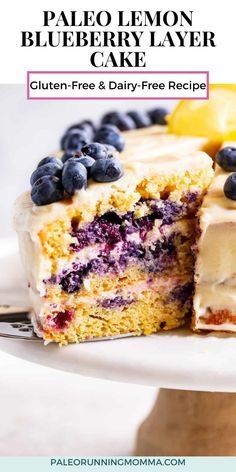 a cake with blueberries and lemon on top