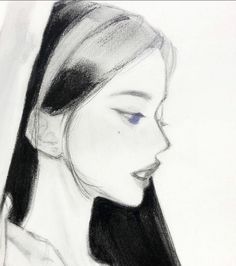 a drawing of a woman's face with blue eyes and long black hair in profile