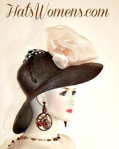 Ladies Dark Chocolate Brown And Coffee Champagne Beige Wide Brimmed Designer Special Occasion Fashion Hat. This Formal Dress Hat Is Trimmed With A Large Champagne Coffee Organza Bow, Accented With Hand Cut Feathers. This Is A Stunning Hat For The Spring Horse Races, The Kentucky Derby, The Belmont Stakes, The Preakness Stakes, The Royal Ascot, The Melbourne Cup, And The Royal Ascot.

This dress hat is suited for Winter, Spring, Summer And Fall.

Material: Dark Brown Polypropylene Straw Braid

Head Size: 22.5 Inches

Crown Style - Rounded Style Crown

Condition: New Custom Made - Hatue Couture Custom Made Hat

We Specialize In Designer Hats For Women, Hats For Weddings, Custom Made Straw Hats For Spring, Bridal Hats, 1920's Flapper Hats, Kentucky Derby Hats, Formal Hats For Women, Church Ha Flapper Hats, Bridal Hats, Special Occasion Hats, Mother Of The Bride Hats, Bespoke Hats, Spring Horse, Custom Made Hats, Preakness Stakes, Large Brim Hat