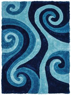 Use this contemporary rug to add a pop of color to your interior style. Multiple shades of sea blue are used to create this marvelous floor covering that will enrich your home decor with its contemporary swirly design. Machine-made and hand-carved polyester rug with cotton backing that will give you a soft yet durable shag rug. United Weavers Of America Finesse 8 X 11 (ft) Frieze Blue Indoor Geometric Area Rug Polyester | 2100 21560 912 Child Bedroom Ideas, Tuft Rugs, Misty Background, Ocean Shark, Swirly Designs, Shades Of Violet, Cadet Blue, Southwestern Design, Polyester Rugs