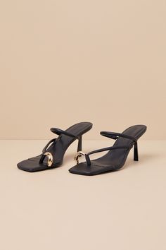 We hope you like compliments because everyone will love you in the Billini Camren Black Strappy High Heel Slide Sandals! These luxe heels have a smooth faux leather construction that shapes a trendy square footbed and an open-toe upper. The thong-style upper features a toe loop adorned with an oversized, oblong gold metal accent, followed by a strappy vamp (with elastic at the side of one strap for fit). Effortless slide-on design sits atop a flirty spool heel. Available in whole sizes only. 3" spool heel. Cushioned insole. Rubber sole has nonskid markings. Man Made Materials. Imported. Lulus | Camren Black Strappy High Heel Slide Sandal Heels | Size 7. Black Strappy High Heels, Strappy High Heels, Spool Heel, Sandal Heels, Metallic Accents, Strappy Heels, Slide Sandals, High Heel, Open Toe