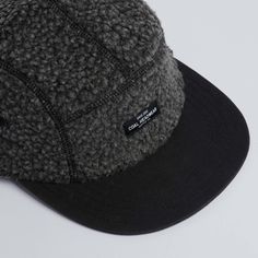 The Linus is designed with a high pile sherpa fleece and waxed canvas brim. It features cover-stitched details, stitched eyelets, and a recycled plastic brim. Five Panel Cap, Dope Hats, 5 Panel Hat, Cap Patterns, Cap Collection, Head Wear, Cap Style, Panel Hat, Cap Men