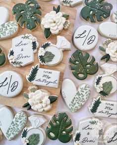 some decorated cookies are sitting on a table