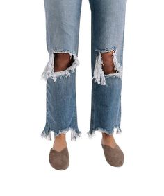 Mid-rise Free People straight leg jeans featuring subtle distressing. Rigid denim Raw hem Five-pocket style Button fly Care/Import: Machine Wash Cold. Import. Measurements for size 28: Waist: 32 1/2", Hips: 40 1/2", Rise: 10 1/2", Inseam: 27"