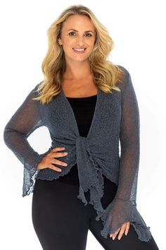 TIE-FRONT DESIGN MAKES THIS BLACK PLUS SIZE LONG SLEEVE BOLERO SHRUG FOR WOMEN a quick and easy layer any time of day; lightweight dress cardigan gives perfect, pretty coverage for upper arms or low-cut dresses LIGHTWEIGHT MESH POLY COTTON BLEND KNIT NEVER WRINKLES; toss this sheer sweater shrug in your bag for evening or date night, or pack it in your carryon as a great travel piece SHEER SHORT CARDIGAN HAS FLATTERING NATURALLY RUFFLED EDGES and long bell sleeves that add to the feminine silhouette; can be worn tied high, low or untied PRETTY AND VERSATILE KNIT BOLERO OPEN CARDIGAN can be worn with almost any outfit; sexy with jeans or shorts, pretty over evening dresses, easy over a bathing suit or for travel HAND WASH, COLD WATER, LAY FLAT TO DRY. Back from Bali creates beautiful, quali Sheer Shrug, Sheer Shawl, Sheer Sweater, Low Cut Dresses, Knit Shrug, Shrug Cardigan, Lightweight Dress, Style Cardigan, Shrug Sweater