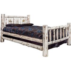 a bed made out of logs with a blue comforter on the top and bottom