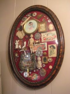 an image of a wall hanging with pictures on it