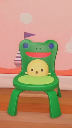 a cartoon frog sitting in a green chair