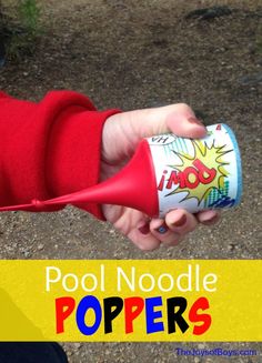 a person holding a red plastic cup with the words pool noodle poppers on it