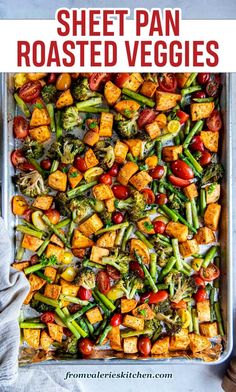 sheet pan roasted veggies with tomatoes, broccoli and green beans in it