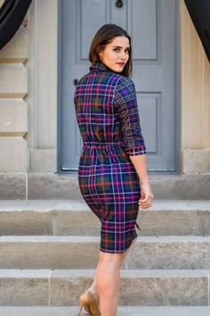 Tartan Scott Twist & Shout Dress Presenting the Tartan Scott Twist & Shout Dress, a stylish blend of traditional tartan and modern design. This dress, crafted from a high-quality acrylic-wool blend, offers warmth, durability, and easy maintenance. With over 5000 tartan patterns to choose from, you can select one that reflects your personal heritage. Customizable in length and sleeves, it features a unique twist detail at the waist for a flattering silhouette. The 4-inch hand hem, brass buttons, Tartan Cocktail Dress, Womens Tartan Dress, Dress Stuart Tartan, Tactical Kilt, Great Kilt, Leather Kilt, Utility Kilt, Scottish Kilts, Brass Buttons