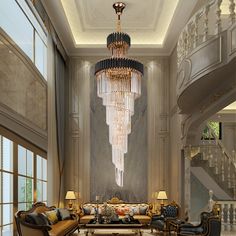 an elegant living room with chandelier and couches