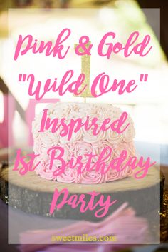 a pink and gold birthday cake with the words, pink & gold'wild one inspired baby 1st birthday party