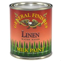 a can of reducer water based dye stain with pine trees in the background