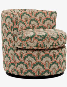 an upholstered chair with green and orange designs