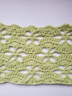 the crochet is green and has holes in it