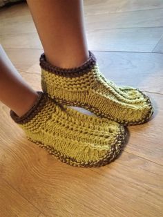 A beautiful pair of women's boot/knitted slippers. Made of 100 % wool yarn they are warm, cozy to wear and have a lot of bulk for extra comfort. Soles are covered with latex, which makes them not slippery to walk and give it a long life. Colors in picture - olive green, dark brown. To make a slippers takes 3-5 days. If you want any other colors, please contact me. CARE: gently handwash in warm water, using a wool detergent. Reshape and let it dry. You will enjoy wearing wonderful warm slippers Hand Knitted Round Toe Slippers For Winter, Cozy Knitted Slippers With Round Toe, Hand Knitted Round Toe Winter Slippers, Hand-knitted Round Toe Winter Slippers, Cozy Hand Knitted Slippers With Round Toe, Cozy Hand-knitted Slippers With Round Toe, Cozy Hand-knitted Round Toe Slippers, Cozy Knitted Booties With Round Toe, Cozy Hand Knitted Round Toe Booties