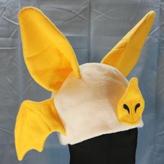 Ultrasoft fleece LEAF NOSED BAT hat with large freestanding, 3D ears, a solid base in natural colors, fun bat wings on the sides, and a 3D leaf nose and stenciled nostrils.  This hat's cozy layers will keep you warm through the coldest days! Perfect for cold weather outdoor fun, a costume, or to make a statement.  Will fit most adults.  Multiple color variations are available so PLEASE specify which color style is preferred. If choosing the Custom Colors option, please write your color choices i Leaf Nosed Bat, Bat Hat, Grey Fox, Fleece Hat, Super Happy, Natural Colors, Multiple Color, Outdoor Fun, My Favorite Part