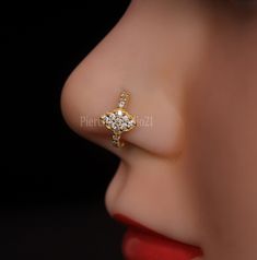 Product Detail : - Material : - 925 Sterling silver, Cubic zirconia gem stone with 14krt Micron gold plating,nickle free Plating Color : - Gold Stone Color:- White (as per Image) Inner Diameter : - 8 mm Wire Gauge size : - 20 Gauge / 0.80 mm Shipping Detail: Processing Time : - 1-2 Working Day Shipping Time : - 15-20 Working days Shipping Service : - USPS,DHL eCommerce,UPS and FedEx. Note :- 1) For Express shipping ( 3-5 Working days ) please check our Upgraded shipping profile. for express we u Elegant Silver Nose Ring With Prong Setting, Elegant Silver Nose Rings For Anniversary, Silver Cubic Zirconia Nose Rings For Gift, Elegant Silver Nose Ring, Elegant Cubic Zirconia Nose Rings, Elegant Diamond Nose Ring Perfect For Gift, Diamond Toe Ring With Prong Setting, Cubic Zirconia Nose Rings With Prong Setting For Wedding, Elegant Cubic Zirconia Nose Rings For Wedding