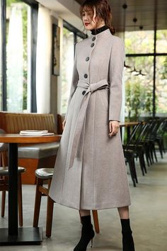 Elevate your winter wardrobe with our Stand Collar Single Breasted Flared Wool Blend Long Coat. Made from a luxurious wool blend, this single breasted coat features a stand collar and belted waist for a chic and flattering fit. The fit & flare style adds a touch of sophistication, making this long coat a must-have for any fashion-forward woman. Stay warm and stylish all season long! ●Single-breasted button closure●Stand collar ●Lined ●Front welt pockets ●Removable tie belt ●50% wool and polyeste Winter Coat For Women, Winter Long Coat, Gray Cashmere, Single Breasted Coat, Wool Blend Coat, Woolen Coat, Cashmere Coat, Winter Coats Women, Tie Belt