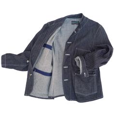 Save 15% when purchasing two or more items from the McKarsten Collection. Use code: McKarsten15 at checkout SPECS * An original MF® pattern inspired by vintage early denim work chore coats (aka engineer jackets), early work uniform cotton jackets, and Old World tailoring.* Fabric: A sturdy 10 Oz. HBT dark indigo denim, 100% cotton, milled in Japan. (Option featuring contrast stitching.)* Stand-collar (“cadet collar”) type, foldable into traditional coat lapels, for a high-button jacket look.* Re Pre-washed Denim Blue Cotton Outerwear, Indigo Cotton Outerwear For Everyday, Dark Wash Cotton Blazer With Pockets, Unstructured Denim Blue Outerwear For Workwear, Dark Wash Cotton Utility Jacket With Buttons, Cotton Utility Jacket With Snap Buttons In Dark Wash, Dark Wash Cotton Utility Jacket With Snap Buttons, Dark Wash Selvedge Outerwear For Work, Pre-washed Denim Outerwear For Workwear