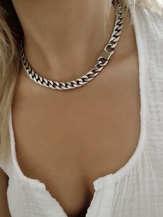 ★ ★ ★FREE SHIPPING ★ ★ ★ PRODUCT DESCRIPTION Silver chunky wide curb chain necklace. This necklace has a modern look and you wear it as it is or can layer it with your personal necklace. If you want to make your outfit look amazing and with a presence, don't miss the necklace on your neck! MEASUREMENT AND SIZE ✦The total length of the necklace is 15 (39cm). Choose your necklace length from the drop-down menu. ✦The chain width is 10 mm. MATERIAL ✦This necklace is made from stainless steel silver- Elegant Chunky Cuban Link Jewelry, Modern Chunky Chain Link Jewelry, Trendy Silver Chain Necklace, Chic Silver Curb Chain Jewelry, Modern Silver Cuban Link Necklace With Chunky Chain, Chic Silver Jewelry With Curb Chain, Modern Chunky Link Jewelry, Trendy Cuban Link Chain Necklace, Trendy Chunky Chain Link Jewelry