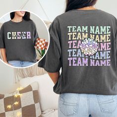 a woman wearing a black shirt with the words team name and checker on it