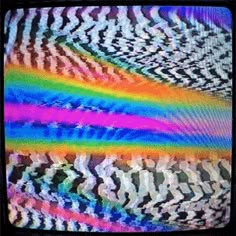 an image of a television screen with colorful lines on it