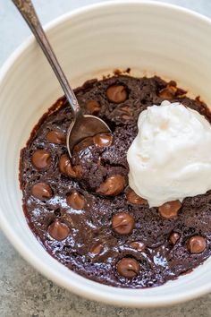 a bowl filled with chocolate pudding and ice cream